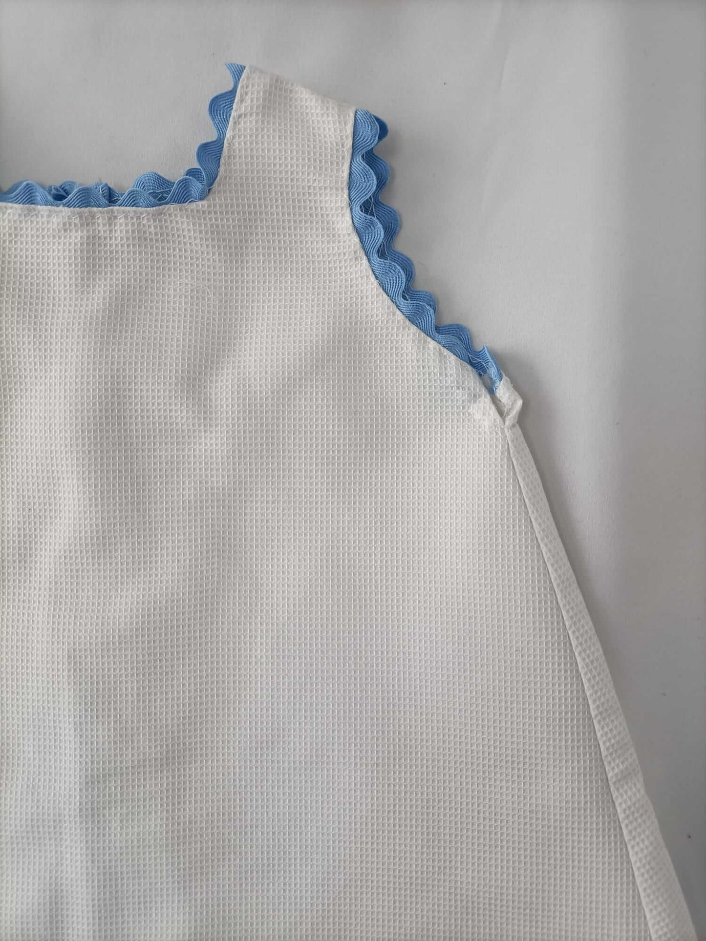 OTRAS.Faldón blanco piqué T.9-12 meses