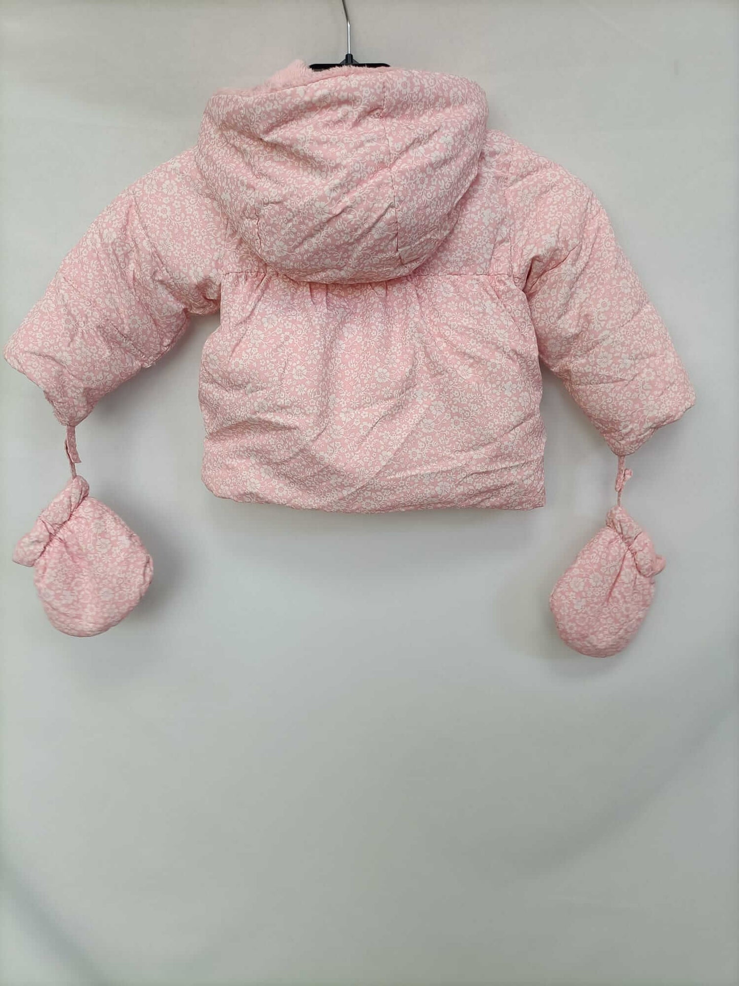 OTRAS.Plumas rosa pelito interior T.9-12 meses