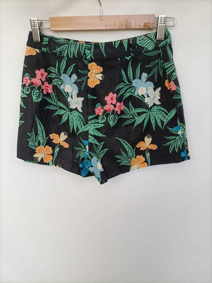 LEFTIES. Black floral trousers, size 34