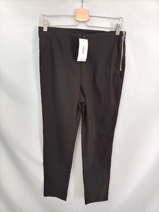 LEFTIES. Black Lycra pants, size XL