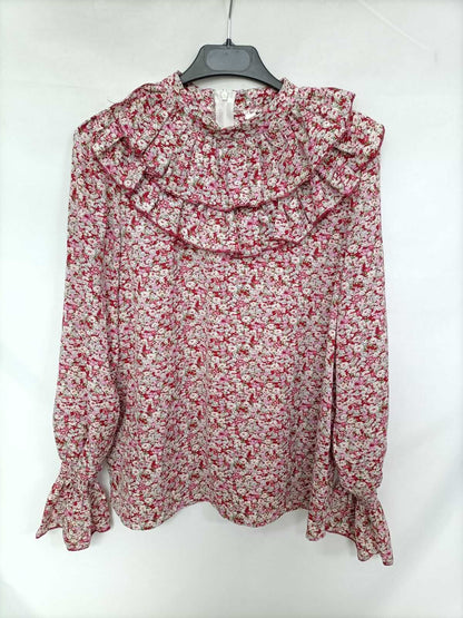 OTRAS. Blusa flores y volantes T.s