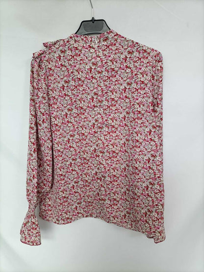 OTRAS. Blusa flores y volantes T.s