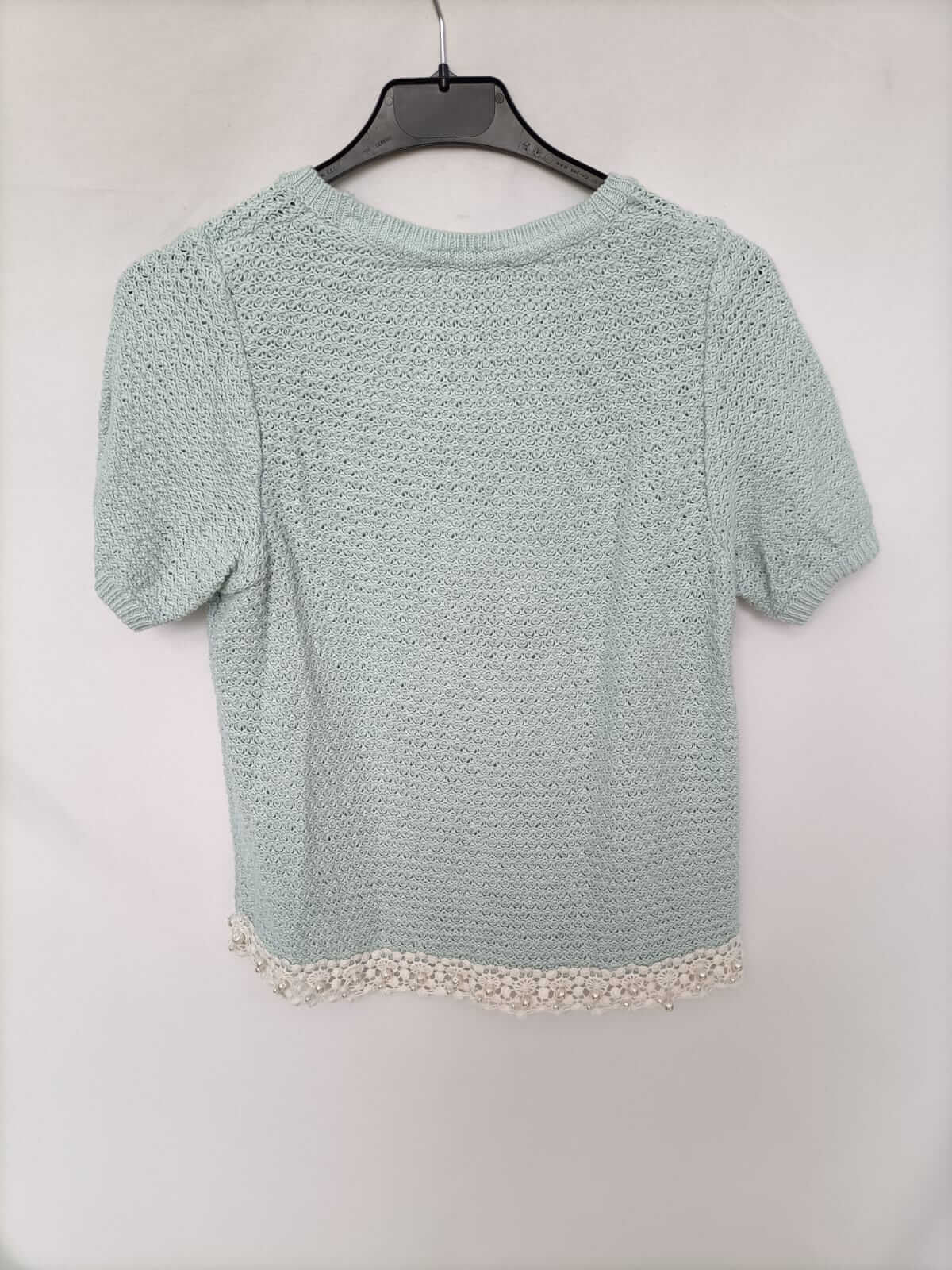 TOPSHOP. Top punto verde agua T.34