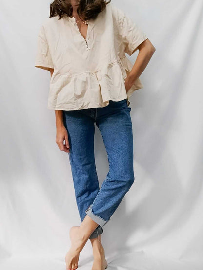 ZARA. Camiseta beige volante T.s