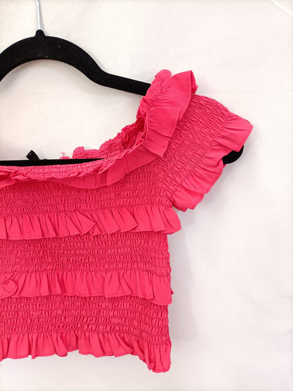 VERO MODA.Croptop fuscia nido abeja T.s