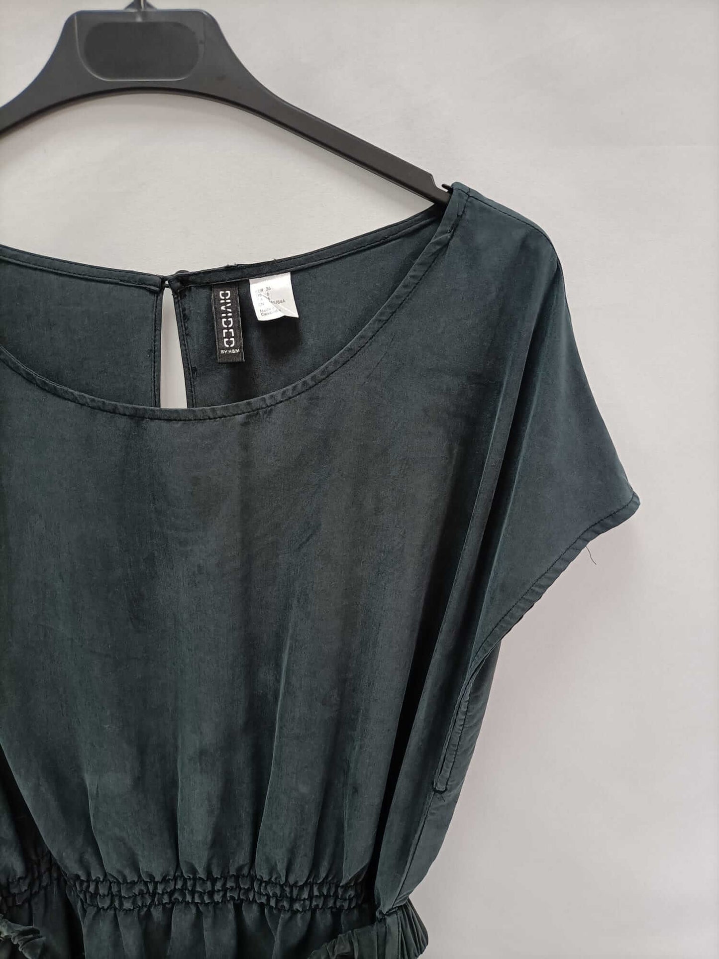H&M. Vestido gris corto T.36