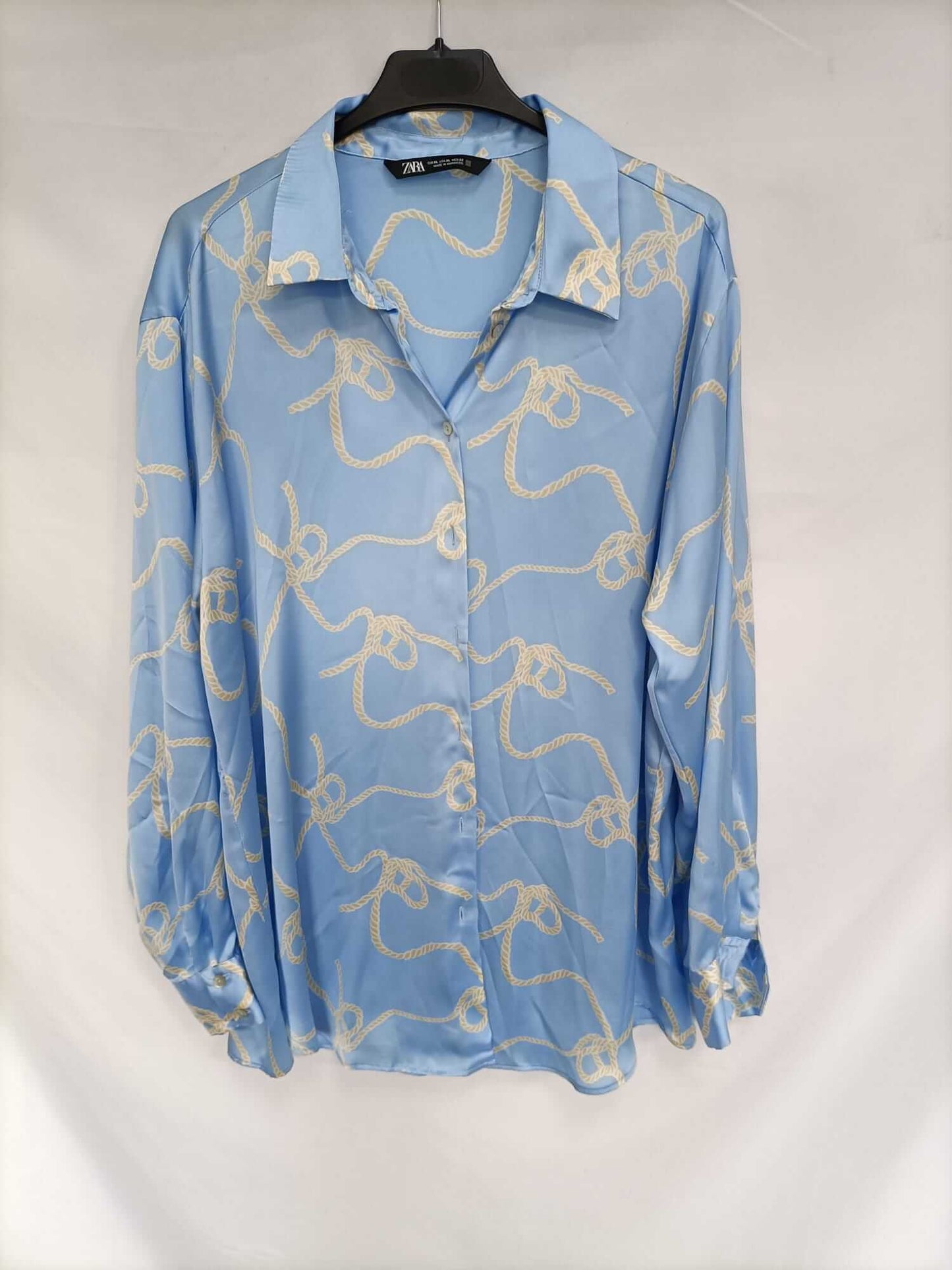 ZARA. Blusa celeste nudos T.xl
