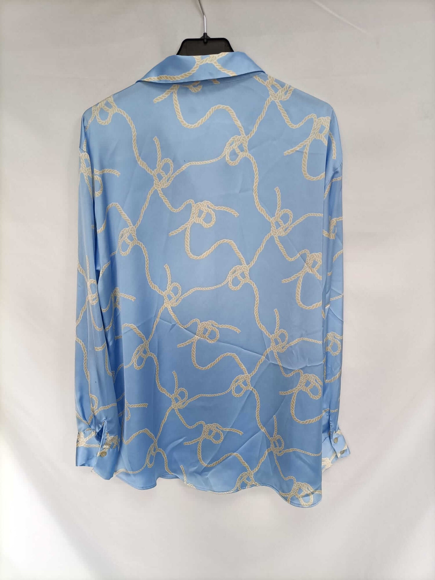 ZARA. Blusa celeste nudos T.xl