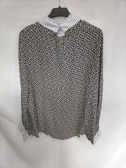 ZARA. Blusa negra flores T.xxl