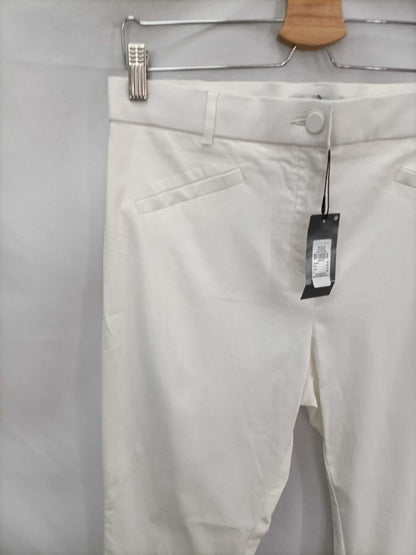 PRIMARK.Pantalones blancos ajustados T.44