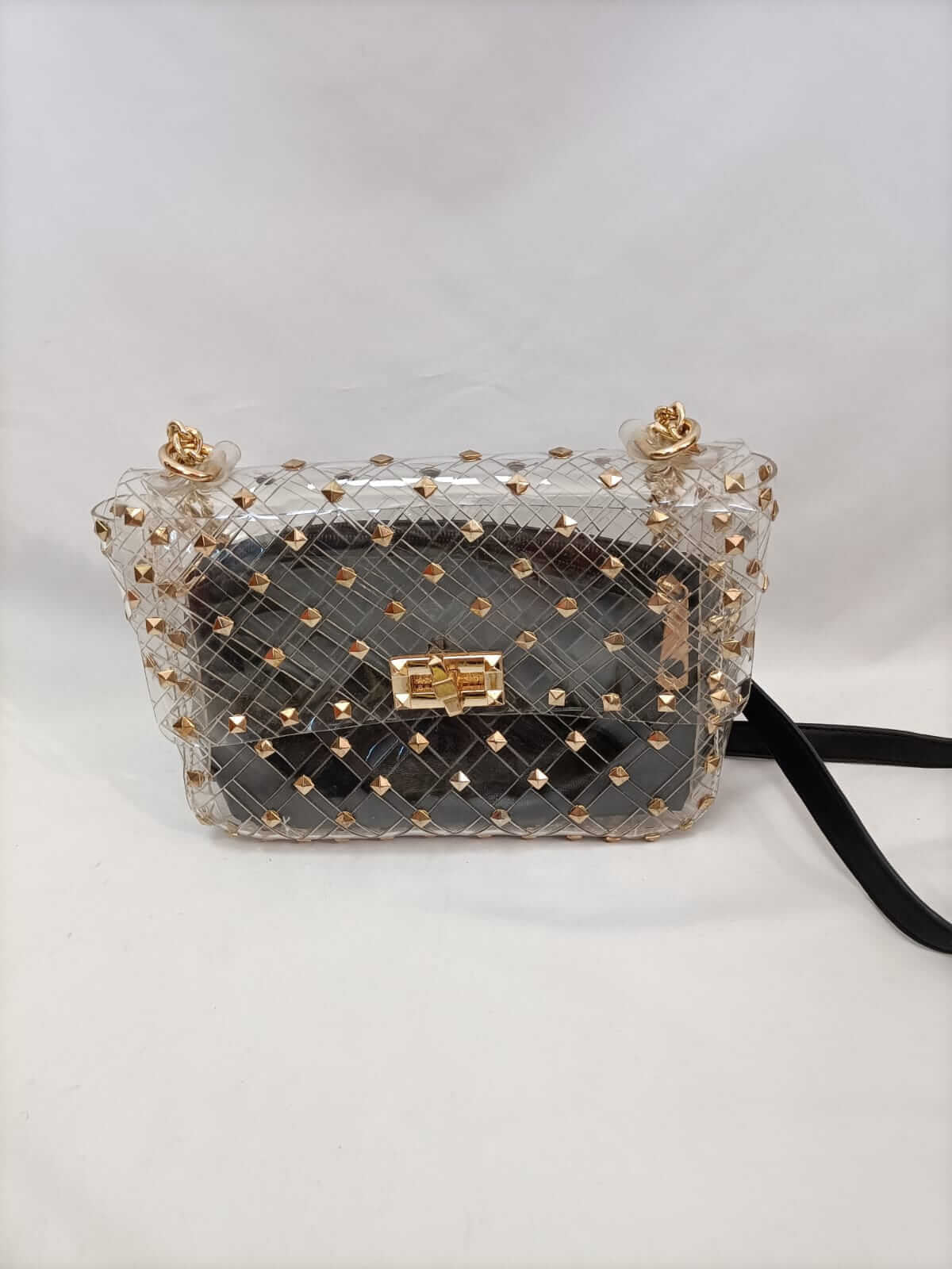 OTRAS.Bolso transparente tachuelas