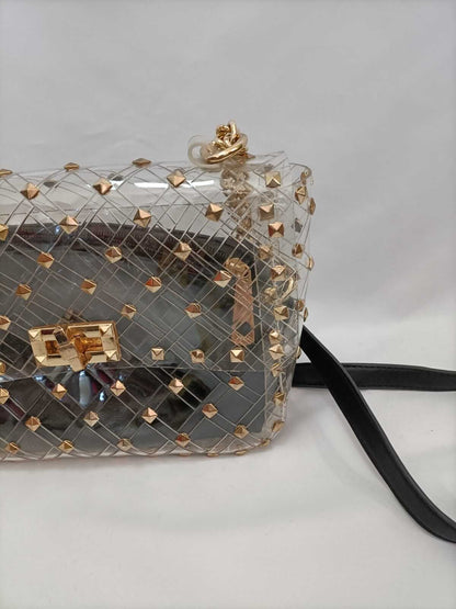 OTRAS.Bolso transparente tachuelas