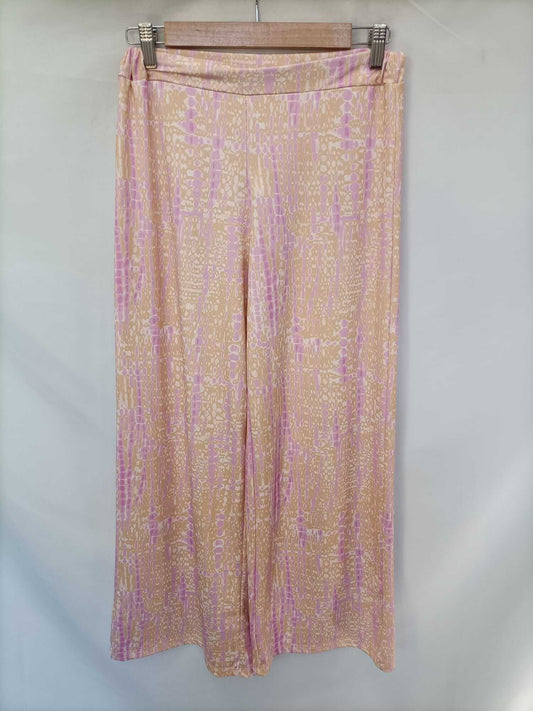 PINPON LILI. Pink and orange printed pants (m/l)