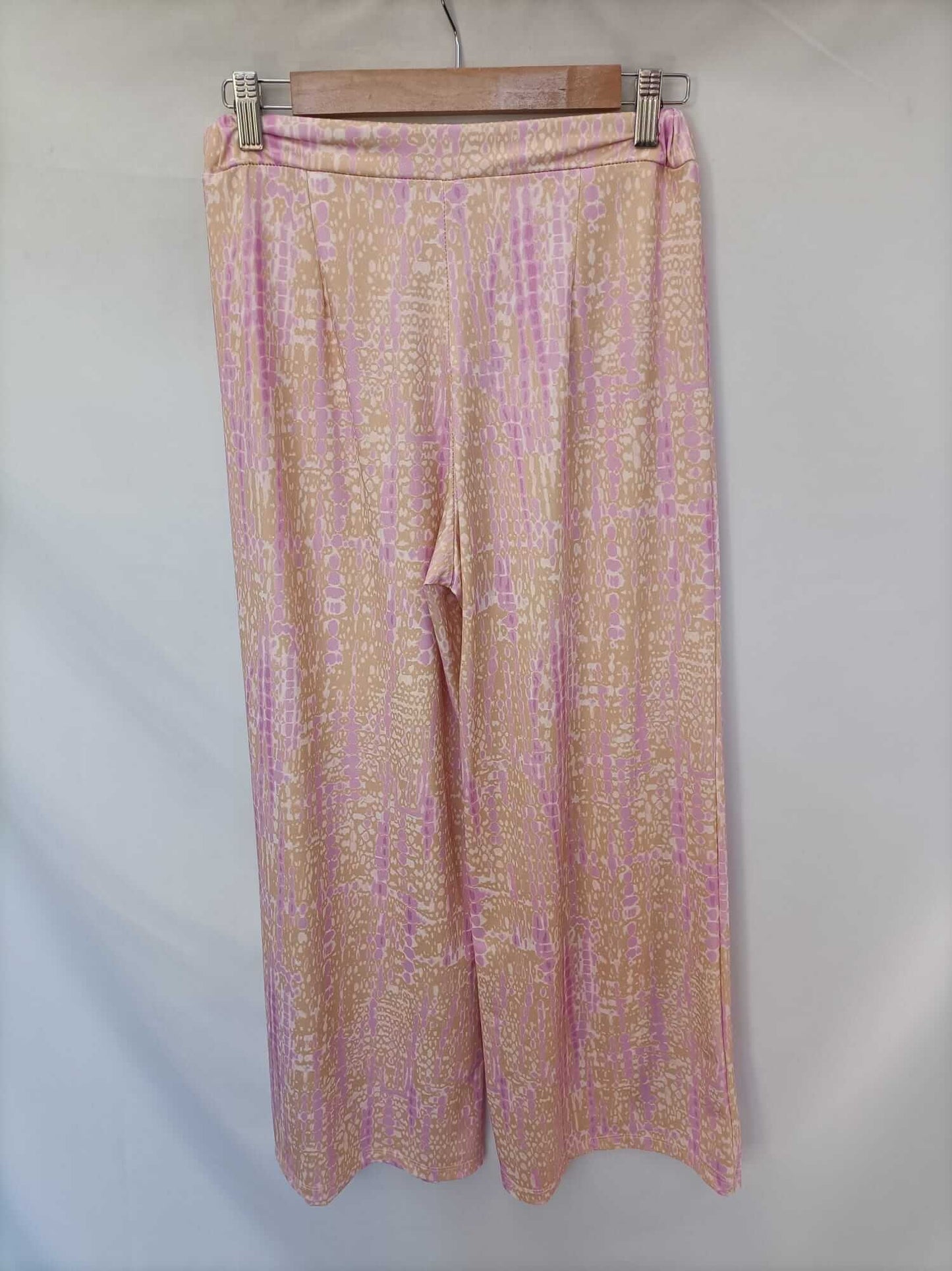 PINPON LILI. Pink and orange printed pants (m/l)