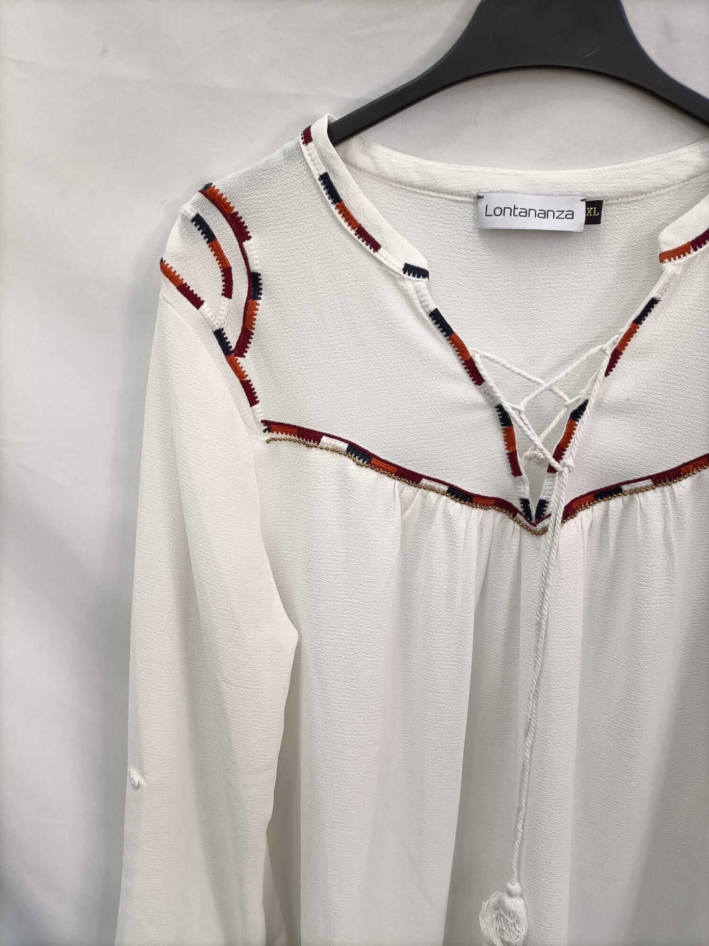 LONTANANZA. Blusa blanca detalle étnicos T.xl