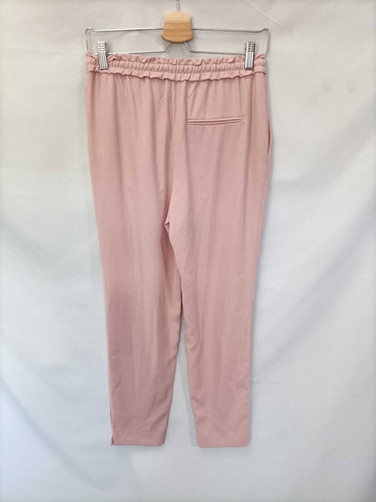 ZARA. Pantalón rosa fluido T.xs