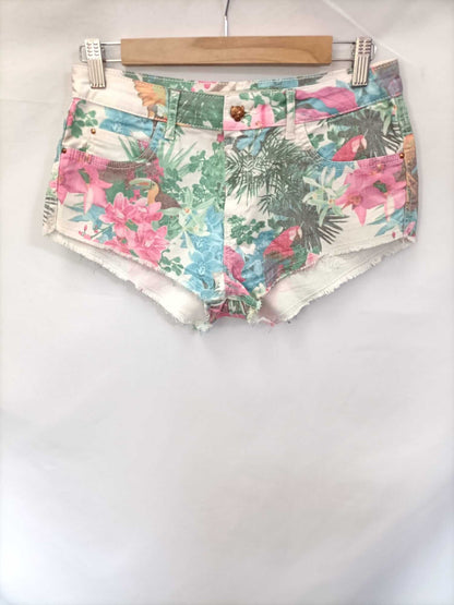 ZARA. Mini shorts flores T.36