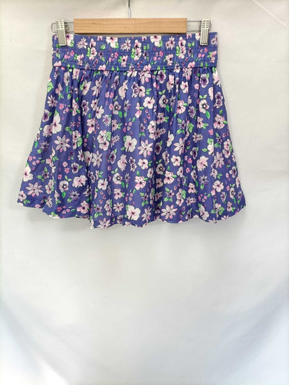 H&M. Falda morada flores T.38