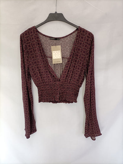 PULL&BEAR.Top burdeos T.s