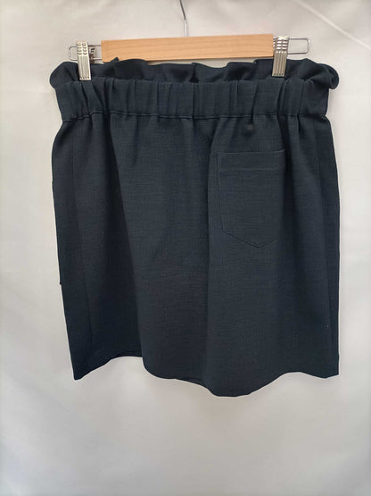 INTROPIA. Falda corta azul T.40