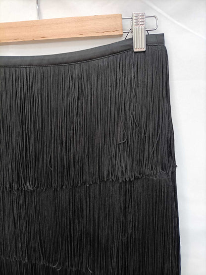 ZARA. Falda corta flecos T.m