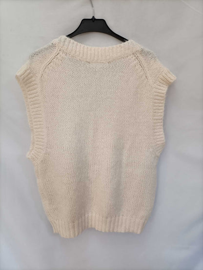 OTHERS. Beige waistcoat with eights (s/m)