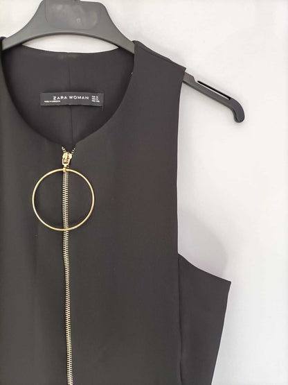 ZARA. Mono negro cremallera T.s