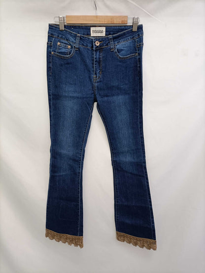 MANZANA. Trousers with TL stitch detail