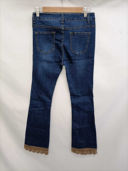 MANZANA. Trousers with TL stitch detail