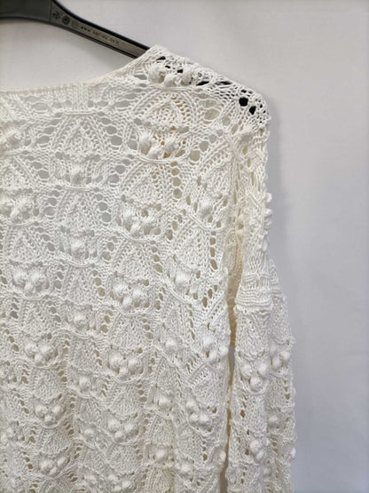 SÉZANE.Jersey beige troquelado T.s