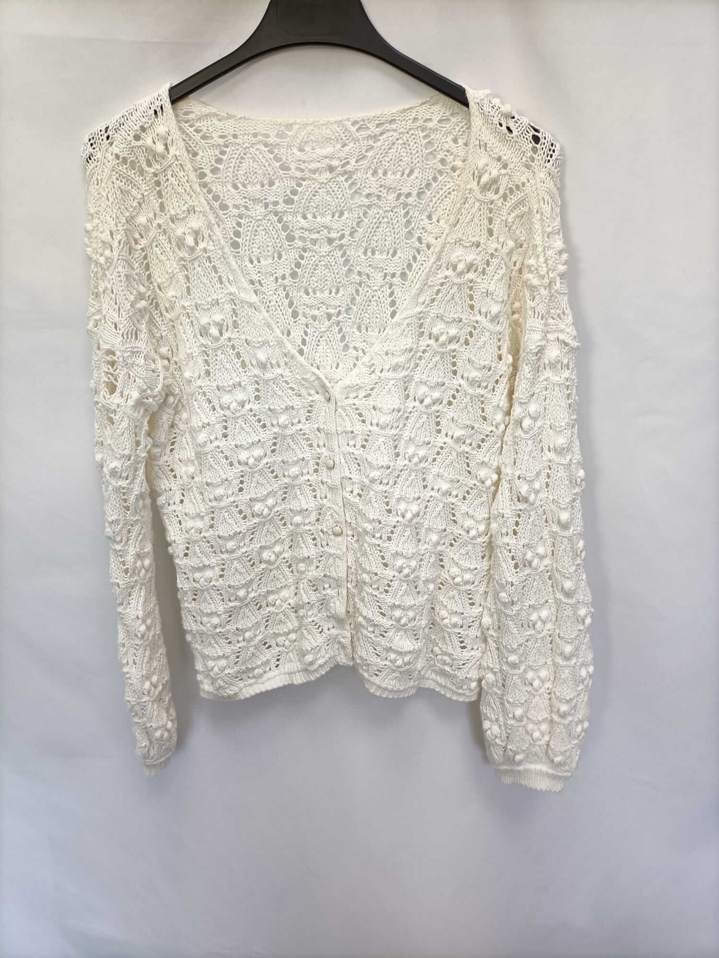 SÉZANE.Jersey beige troquelado T.s