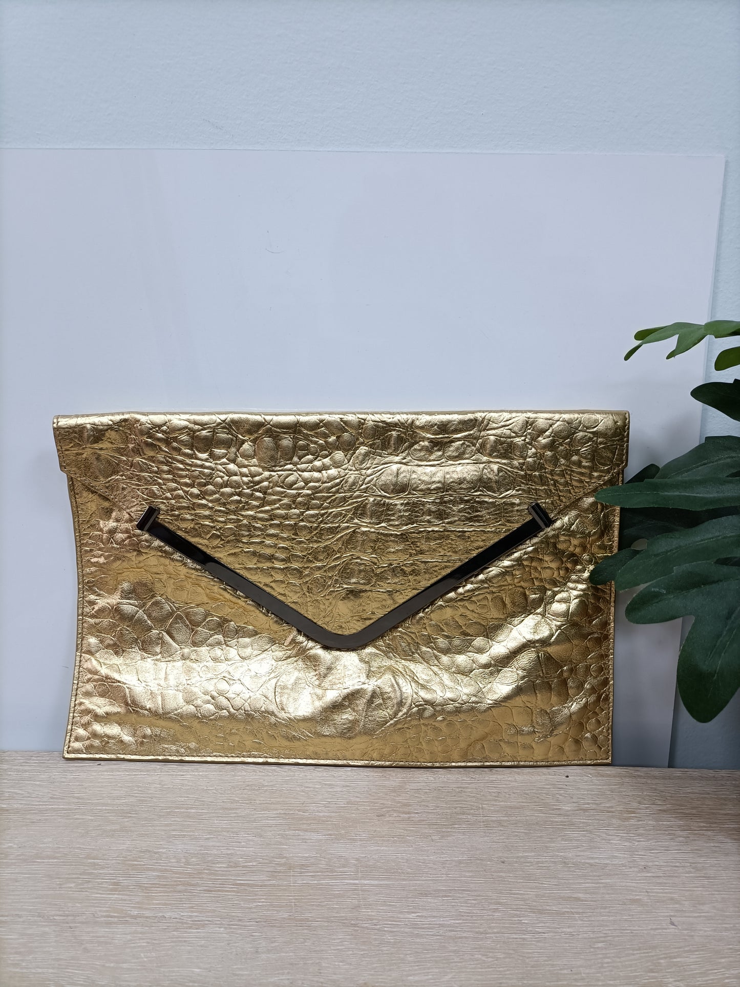 OTHERS. Gold-plated clutch bag