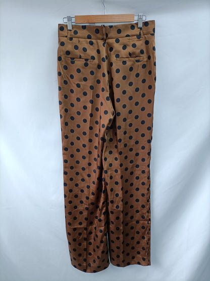 ZARA. Pantalón lunares T.s