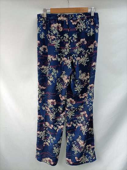 AMICHI. Pantalón azul flores T.m
