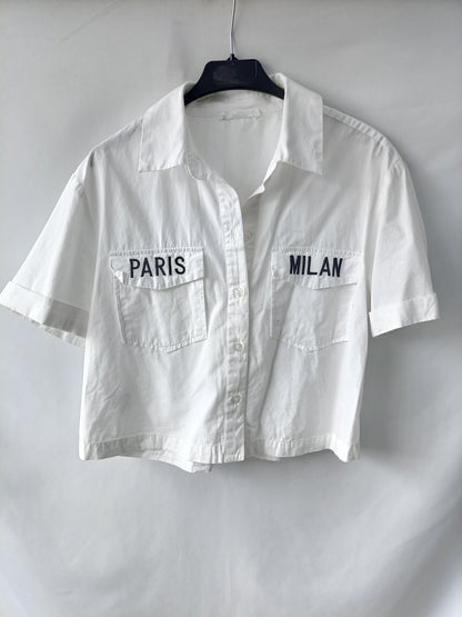 MANGO. White shirt with TM letters