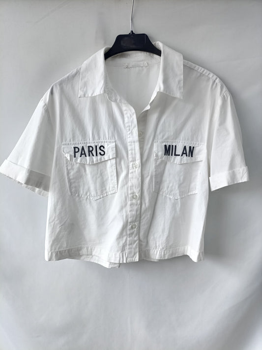 MANGO. White shirt with TM letters