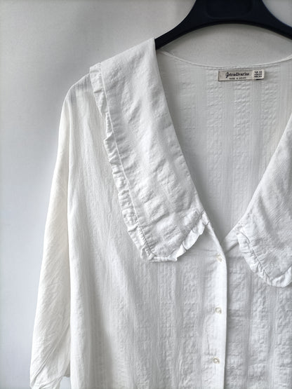 STRADIVARIUS. Blusa fluida textura T.xs