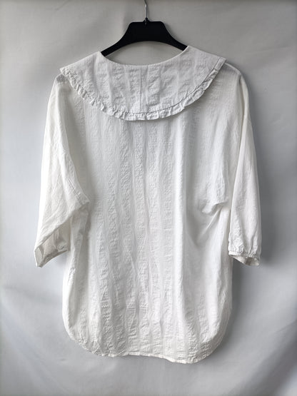 STRADIVARIUS. Blusa fluida textura T.xs