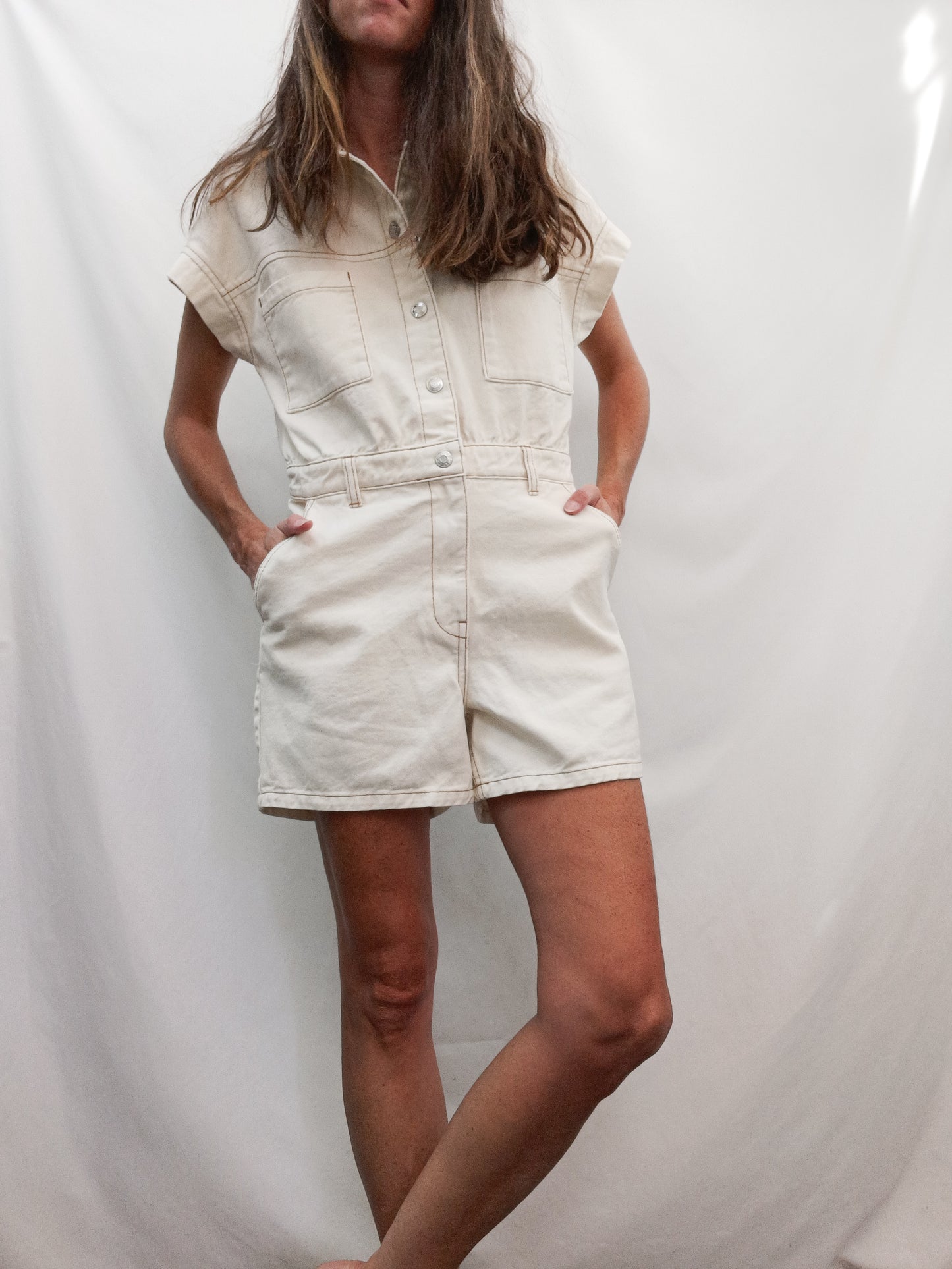 PRIMARK.Mono corto beige denim T.38 (TARA)