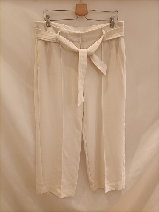 MANGO. Flowy wide-leg trousers Tl