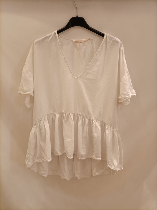ZARA. Top blanco volante T.l