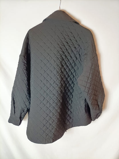 ZARA. Parka negra guateada T.s