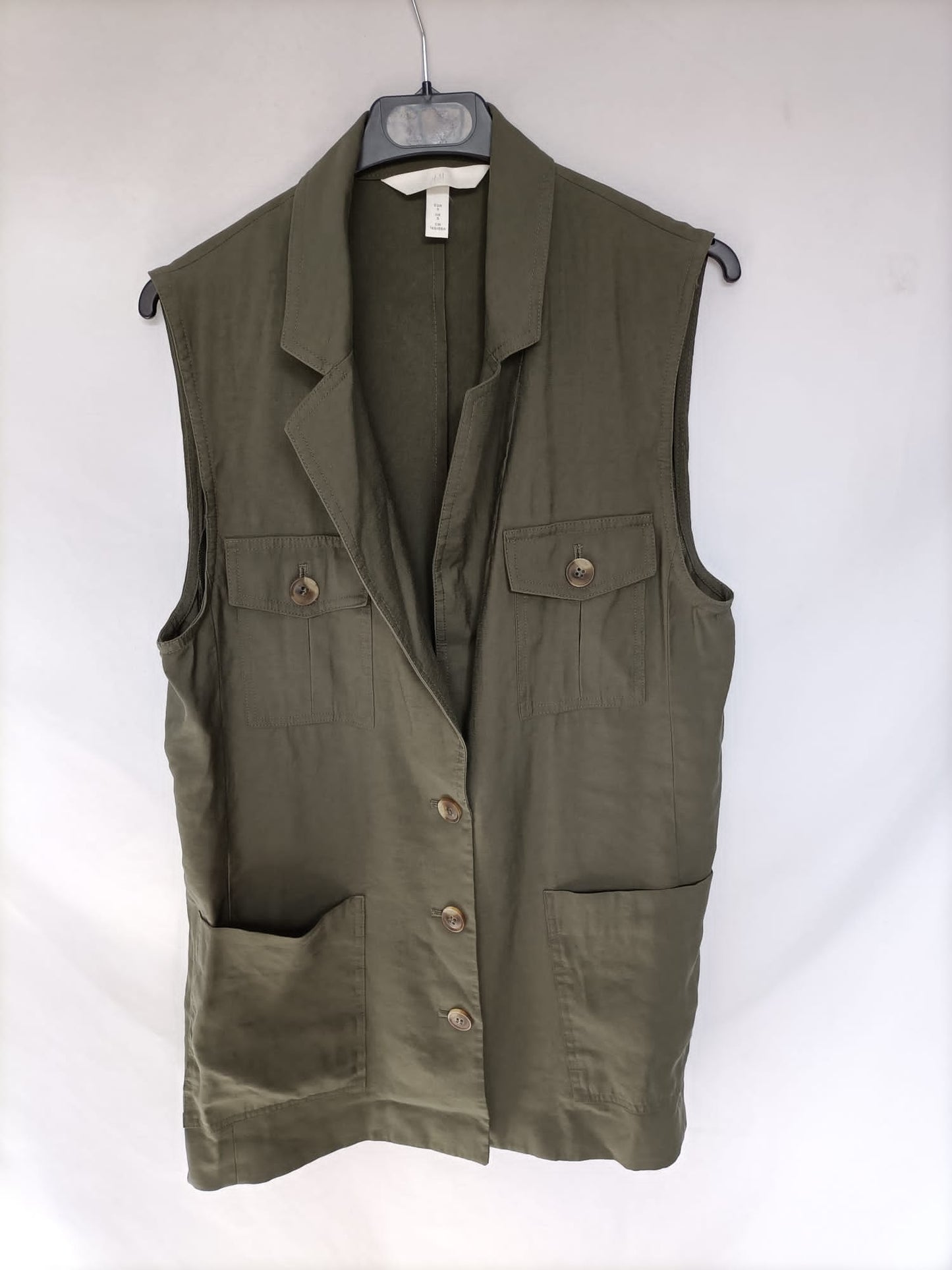 H&M: Chaleco verde abotonado T.s