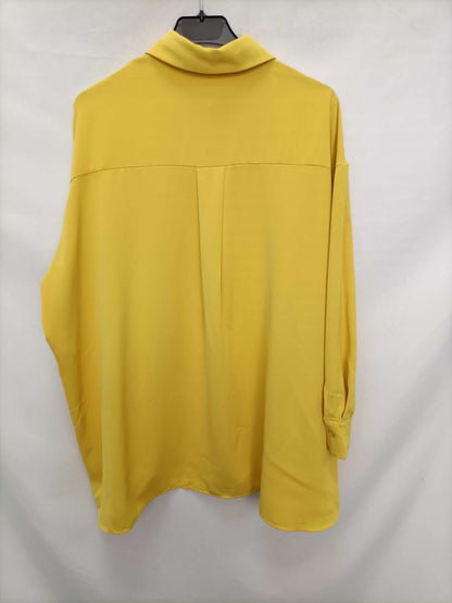 OTRAS. Blusa amarilla oversized T.l/xl