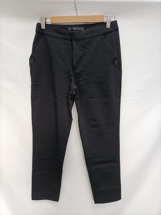 ZARA.Pantalones negros elásticos formales T.s