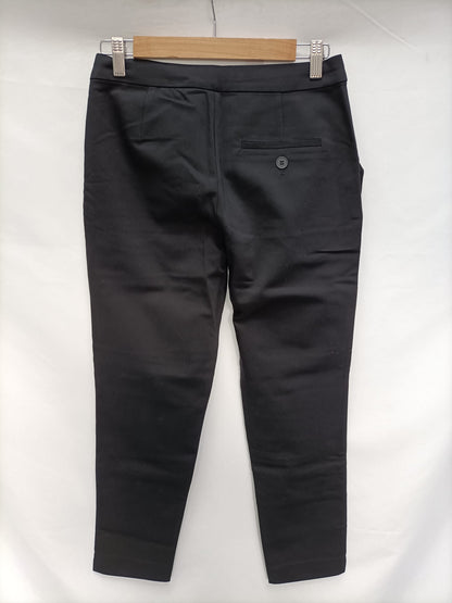 ZARA.Pantalones negros elásticos formales T.s