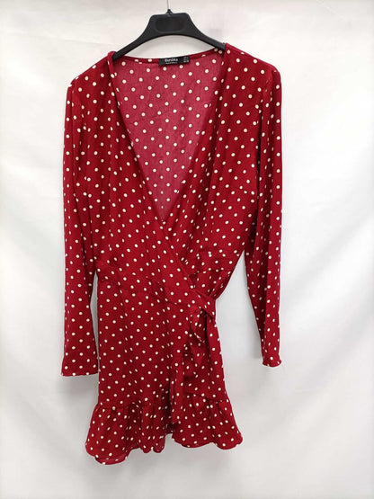 BERSHKA.Vestido corto lunares T.L