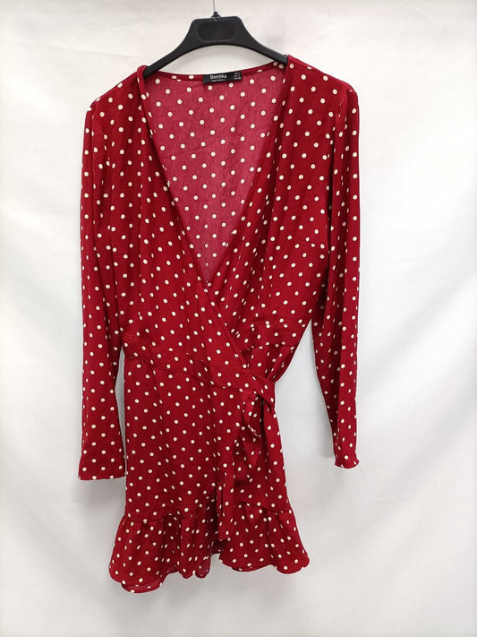 BERSHKA.Vestido corto lunares T.L