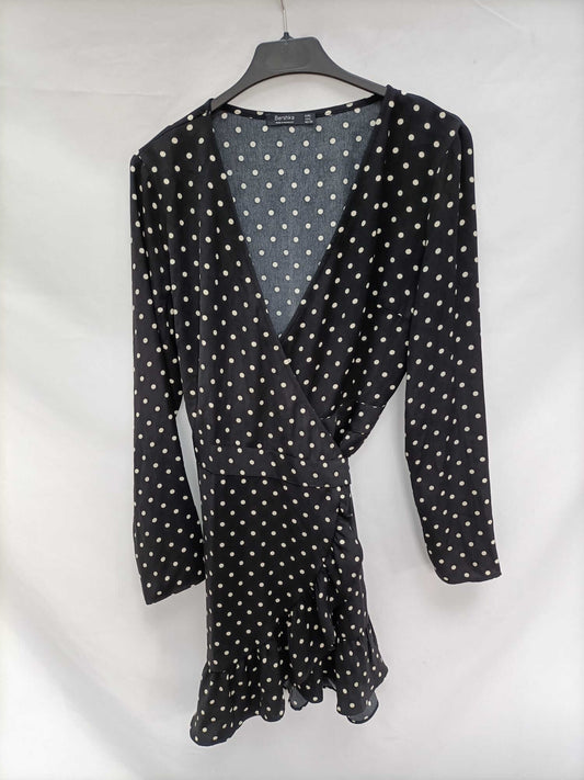BERSHKA.Vestido corto lunares T.L