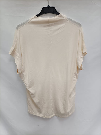 MANGO.Camiseta beige oversized cuello perkins T.m